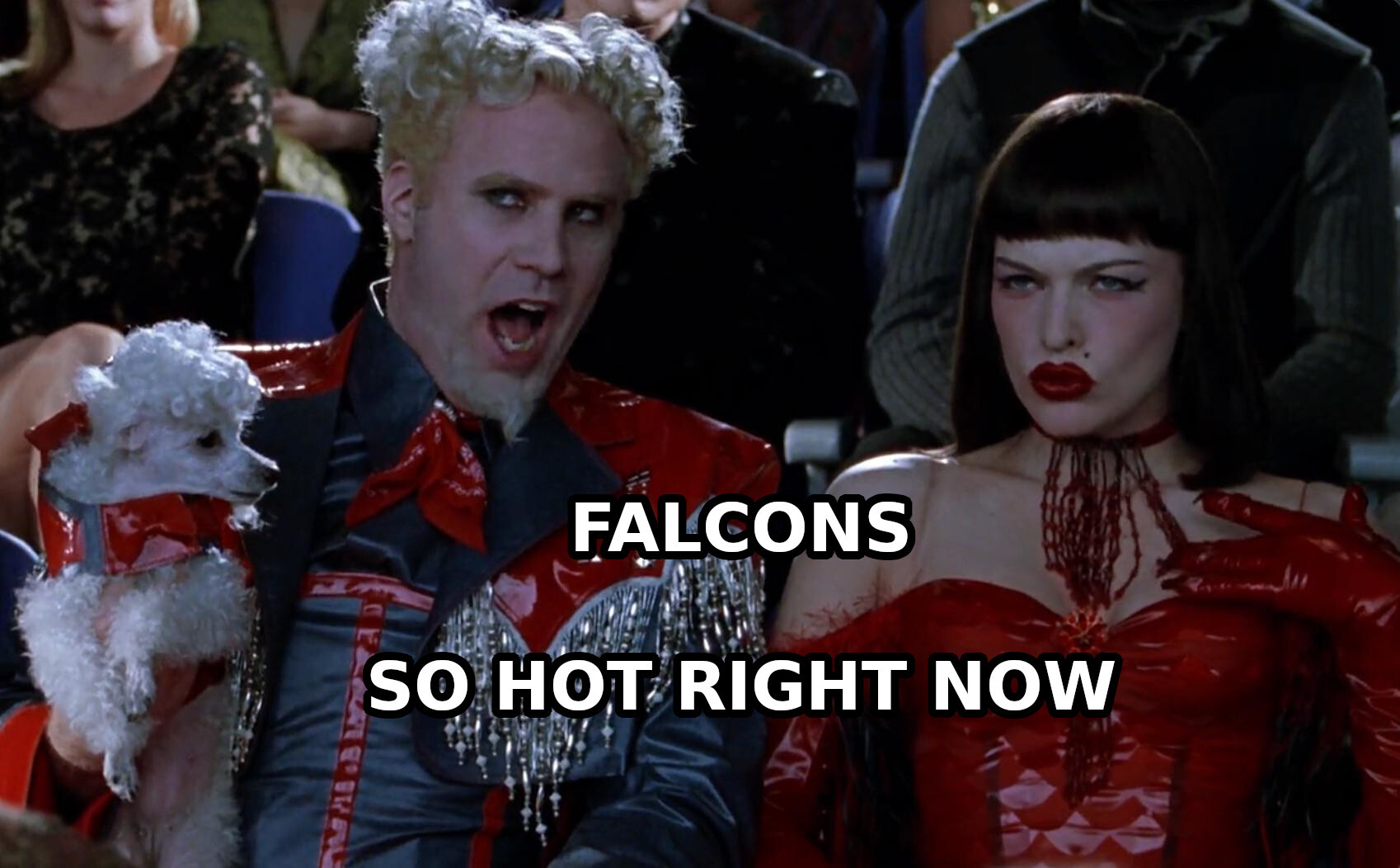 The "so hot right now" meme template of Zoolander. A faboulous guy holding a styled, white poodle, leaning as to say something to his companion, an aroused-looking lady in a red dress. The caption says "FALCONS SO HOT RIGHT NOW"